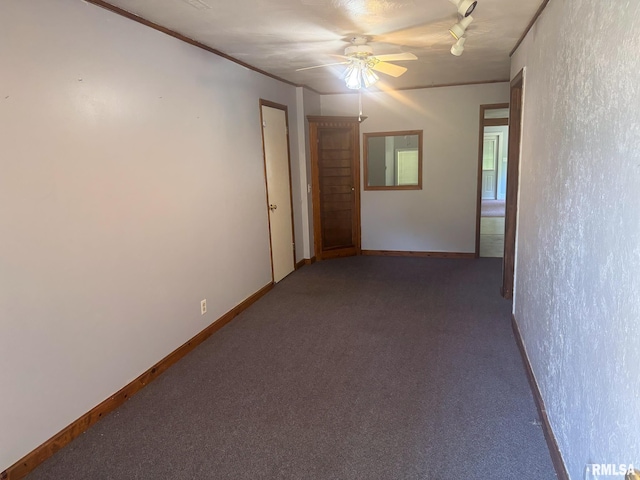 220 E Adams St, Petersburg, IL 62675 - carpeted empty room with ceiling fan and ornamental molding