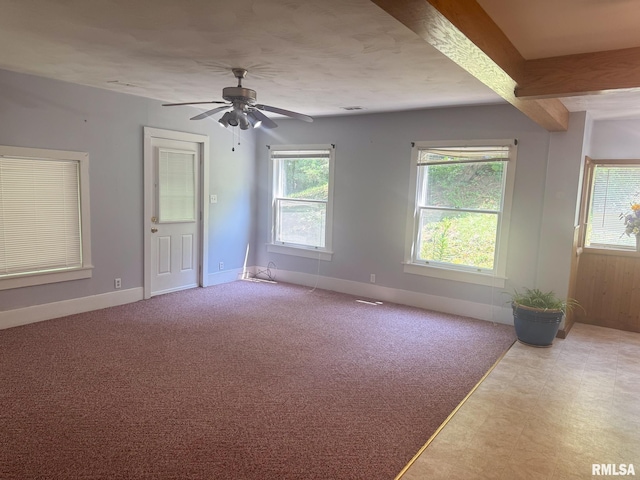 220 E Adams St, Petersburg, IL 62675 - spare room with a ceiling fan and beam ceiling