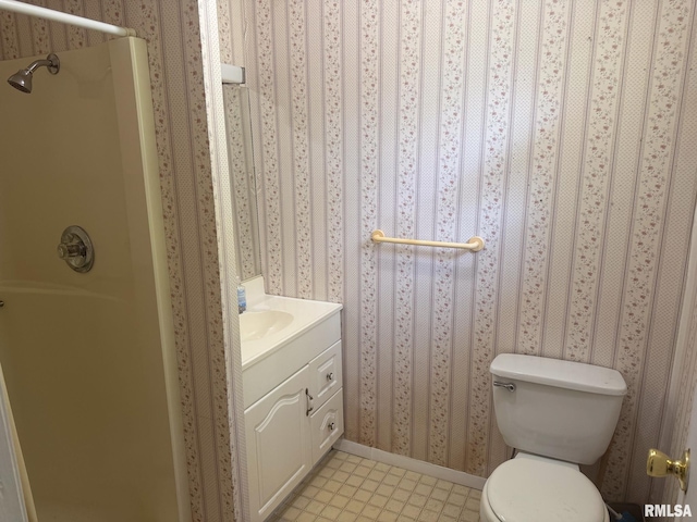 220 E Adams St, Petersburg, IL 62675 - bathroom featuring vanity, a shower, and wallpapered walls