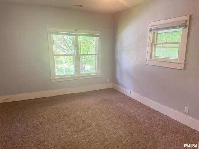 220 E Adams St, Petersburg, IL 62675 - carpeted spare room featuring baseboards