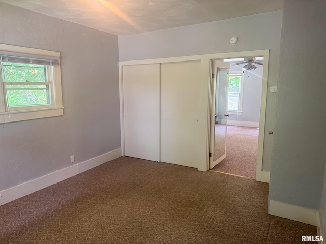 220 E Adams St, Petersburg, IL 62675 - unfurnished bedroom featuring carpet and a closet
