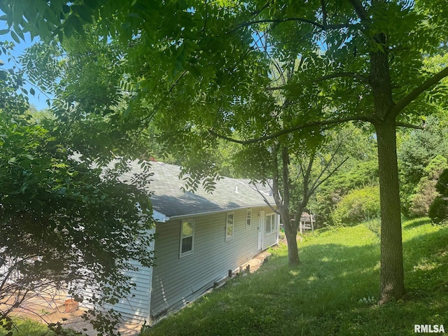 220 E Adams St, Petersburg, IL 62675 - view of side of property with a lawn