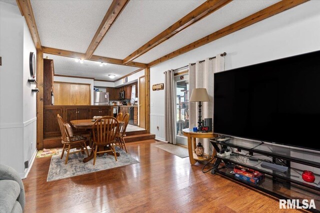 838 Hackberry Rd, Chatham, IL 62629 - dining room featuring wood finished floors and beam ceiling