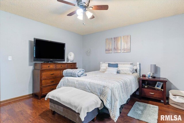 838 Hackberry Rd, Chatham, IL 62629 - bedroom with wood finished floors, a textured ceiling, and a ceiling fan