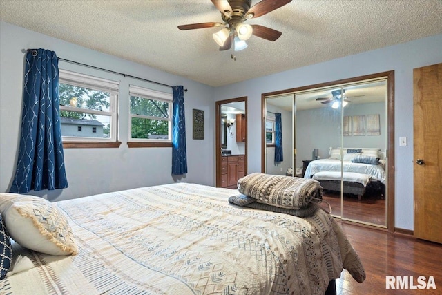838 Hackberry Rd, Chatham, IL 62629 - bedroom featuring wood finished floors, a closet, a textured ceiling, a ceiling fan, and connected bathroom