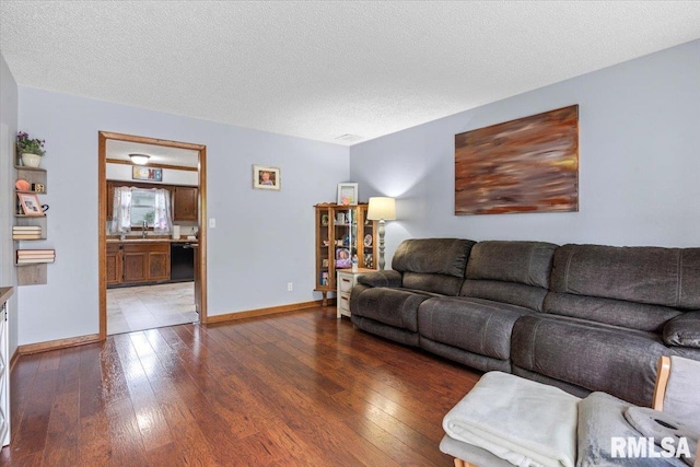 838 Hackberry Rd, Chatham, IL 62629 - living area featuring dark wood-style floors and a textured ceiling
