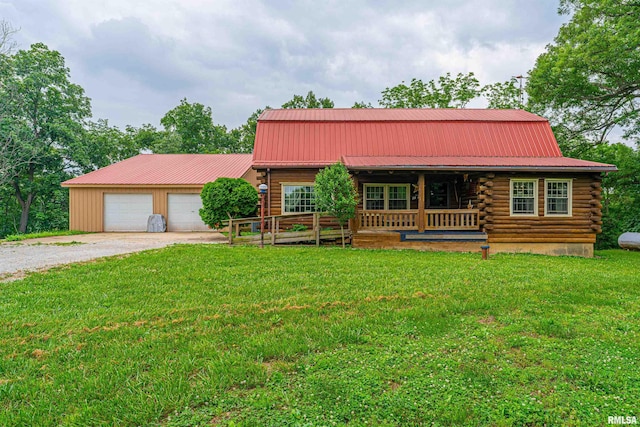 5190 Park Rd, Clinton, IL 61727 - log cabin featuring log exterior, a metal roof, a porch, and a front yard