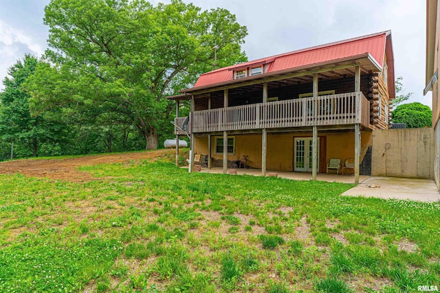 5190 Park Rd, Clinton, IL 61727 - rear view of house with french doors, a patio area, a metal roof, and a deck
