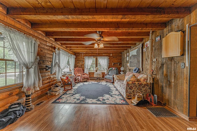 5190 Park Rd, Clinton, IL 61727 - unfurnished living room with rustic walls, a wooden ceiling with exposed beams, hardwood / wood-style flooring, and ceiling fan