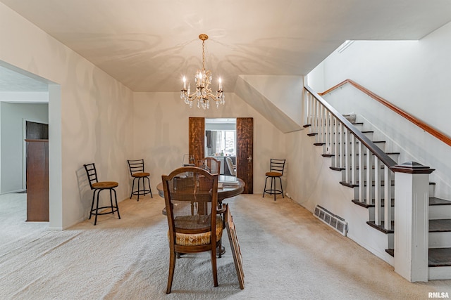 9320 Dawson Ln, Riverton, IL 62561 - carpeted dining space featuring a chandelier and stairway