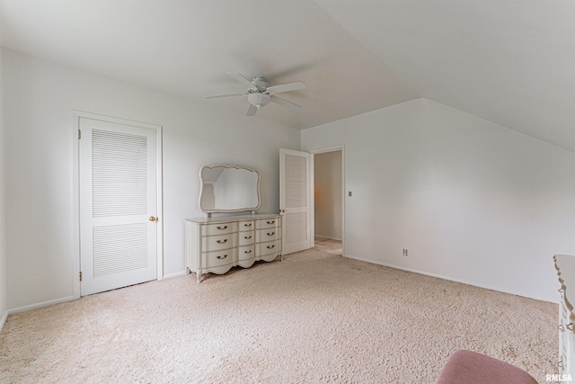 9320 Dawson Ln, Riverton, IL 62561 - unfurnished bedroom featuring carpet flooring, lofted ceiling, and ceiling fan