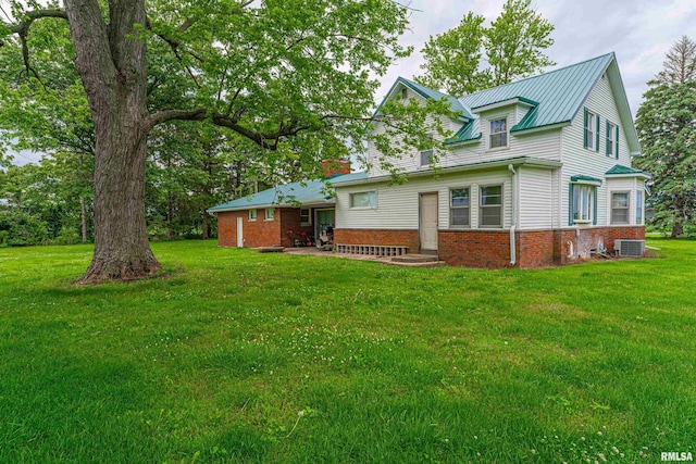 9320 Dawson Ln, Riverton, IL 62561 - back of property featuring a yard