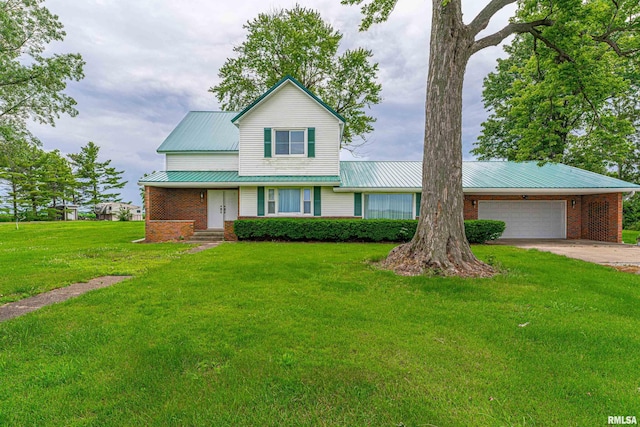9320 Dawson Ln, Riverton, IL 62561 - traditional home with an attached garage, a front lawn, brick siding, concrete driveway, and a metal roof