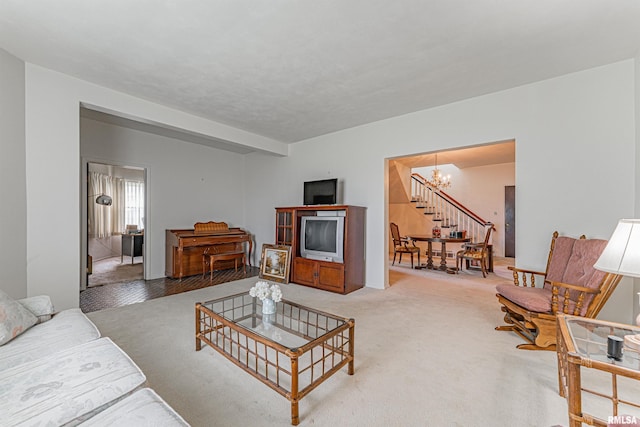9320 Dawson Ln, Riverton, IL 62561 - living area with a chandelier, carpet floors, and stairs