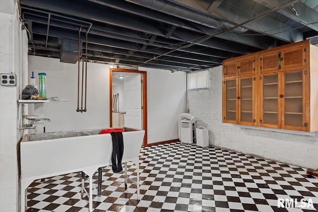 2141 S 4th St, Springfield, IL 62703 - basement featuring tile patterned floors and brick wall