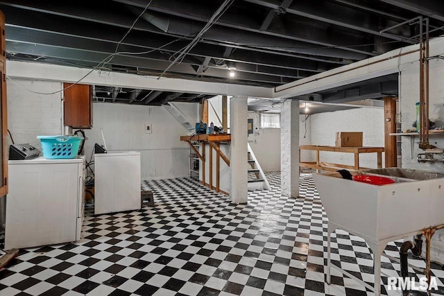 2141 S 4th St, Springfield, IL 62703 - below grade area featuring tile patterned floors and washing machine and dryer