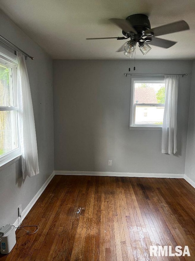 604 Eastman Ave Unit A, Springfield, IL 62702 - spare room with wood finished floors and ceiling fan