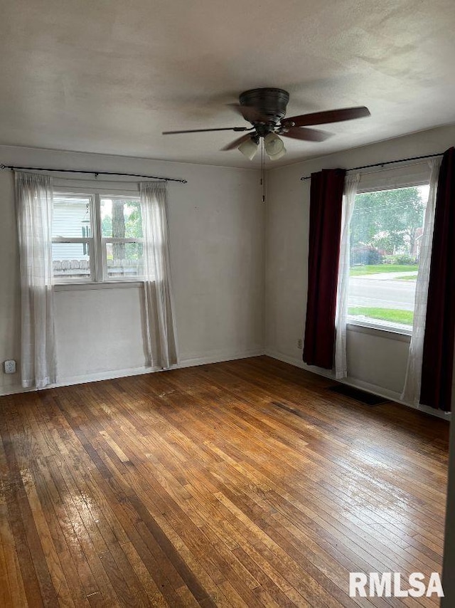 604 Eastman Ave Unit A, Springfield, IL 62702 - spare room featuring hardwood / wood-style flooring and a ceiling fan