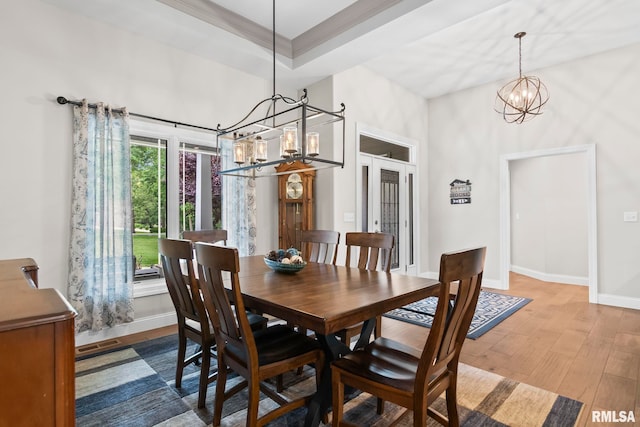 10 The Elms Ln, Springfield, IL 62712 - dining space with a chandelier, a high ceiling, wood finished floors, and crown molding
