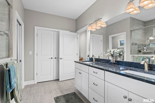 10 The Elms Ln, Springfield, IL 62712 - bathroom featuring double vanity and a shower stall