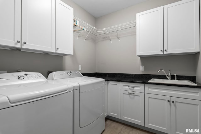 10 The Elms Ln, Springfield, IL 62712 - laundry room featuring washer and dryer, cabinet space, and light wood-style flooring
