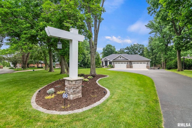 10 The Elms Ln, Springfield, IL 62712 - view of front of house featuring asphalt driveway, a front yard, and a garage
