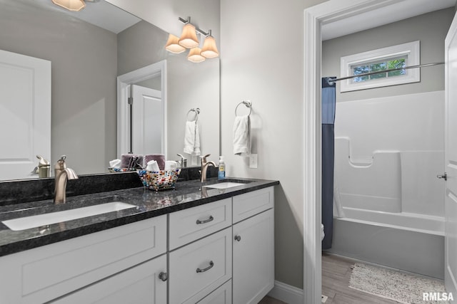 10 The Elms Ln, Springfield, IL 62712 - full bath with double vanity, shower / bath combo, and wood finished floors