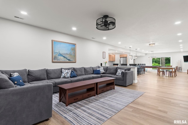 10 The Elms Ln, Springfield, IL 62712 - living area with recessed lighting and light wood-style flooring