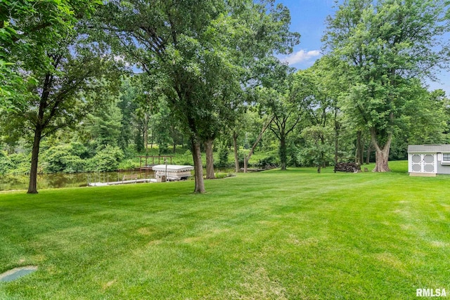 10 The Elms Ln, Springfield, IL 62712 - view of grassy yard featuring a shed and a water view