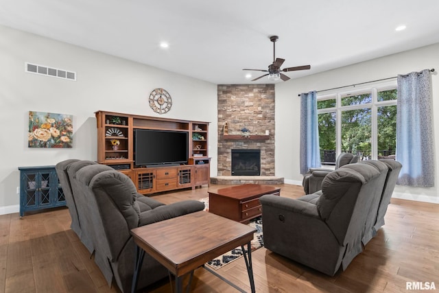 10 The Elms Ln, Springfield, IL 62712 - living room with ceiling fan, wood finished floors, a stone fireplace, and recessed lighting