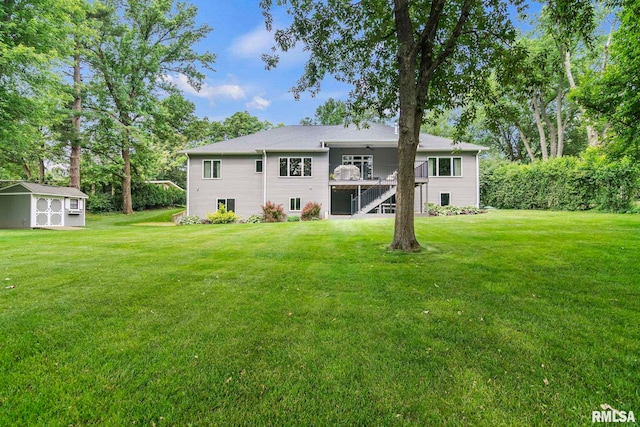 10 The Elms Ln, Springfield, IL 62712 - back of property featuring a lawn, a storage shed, a ceiling fan, and stairway