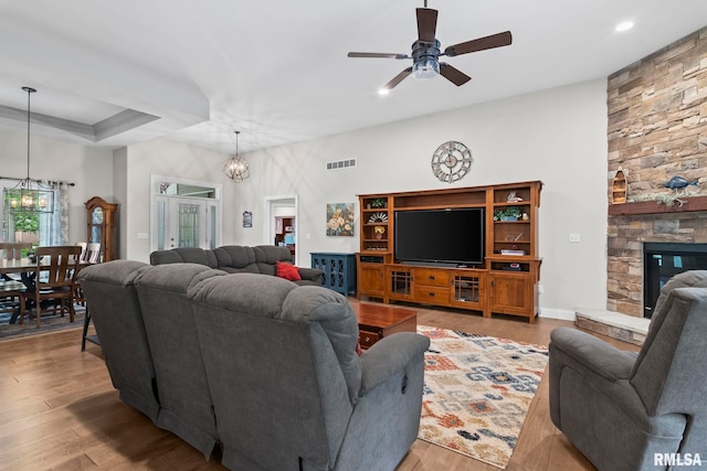 10 The Elms Ln, Springfield, IL 62712 - living area featuring a chandelier, a ceiling fan, light wood-type flooring, a fireplace, and recessed lighting
