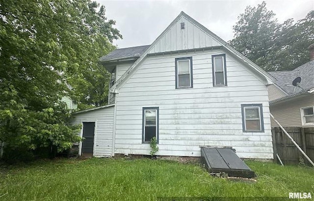 518 E 4th Ave, Monmouth, IL 61462 - rear view of house featuring board and batten siding