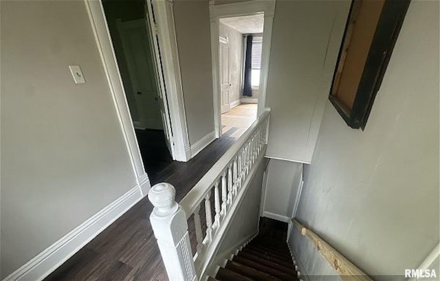 518 E 4th Ave, Monmouth, IL 61462 - staircase featuring wood finished floors and baseboards