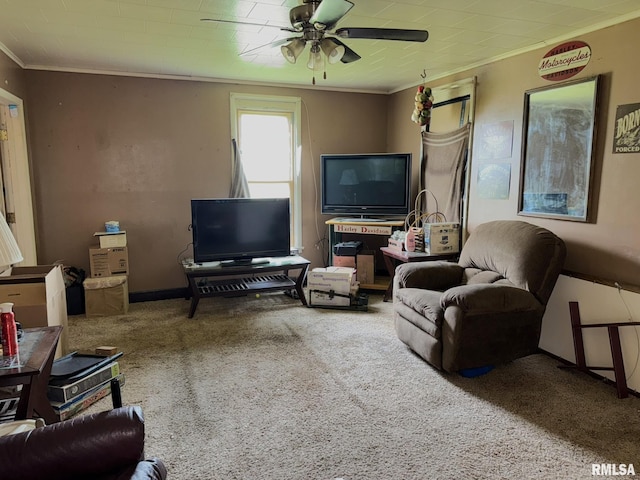931 S A St, Monmouth, IL 61462 - carpeted living area featuring crown molding and a ceiling fan