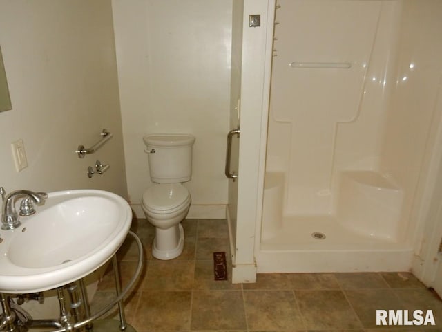 635 S Seigel St, Decatur, IL 62522 - bathroom featuring a shower stall and tile patterned flooring