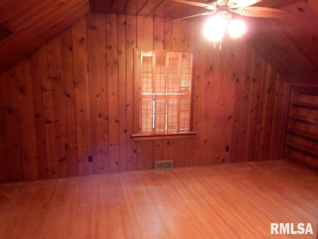 635 S Seigel St, Decatur, IL 62522 - additional living space featuring lofted ceiling, wooden walls, wood finished floors, and a ceiling fan