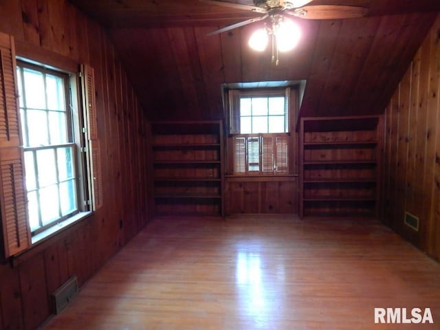 635 S Seigel St, Decatur, IL 62522 - additional living space featuring wooden walls, lofted ceiling, ceiling fan, and wood finished floors