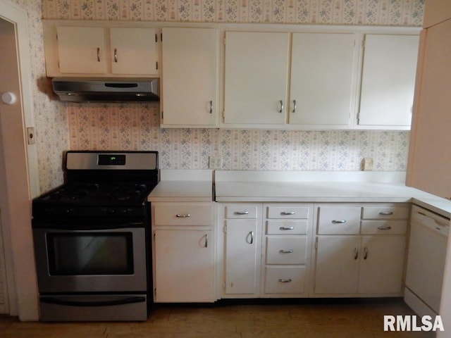 635 S Seigel St, Decatur, IL 62522 - kitchen featuring wallpapered walls, gas range, exhaust hood, white dishwasher, and light countertops
