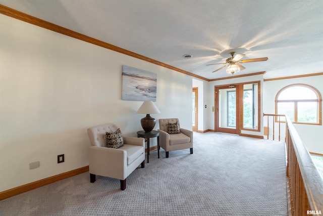 3939 Musholt Strasse Ln, Quincy, IL 62305 - living area featuring ornamental molding, carpet flooring, and a ceiling fan