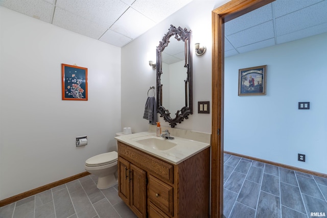 3939 Musholt Strasse Ln, Quincy, IL 62305 - bathroom featuring a paneled ceiling, vanity, and tile patterned flooring