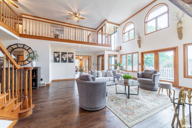 3939 Musholt Strasse Ln, Quincy, IL 62305 - living room with stairs, a high ceiling, dark wood-type flooring, a ceiling fan, and ornamental molding