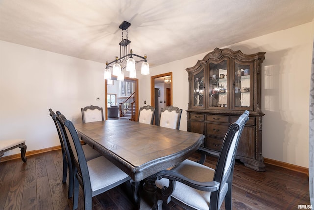 3939 Musholt Strasse Ln, Quincy, IL 62305 - dining room with dark wood-style flooring and stairs