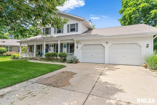 3713 Tyler Ct, Springfield, IL 62711 - traditional-style house featuring an attached garage, covered porch, a front yard, a chimney, and concrete driveway