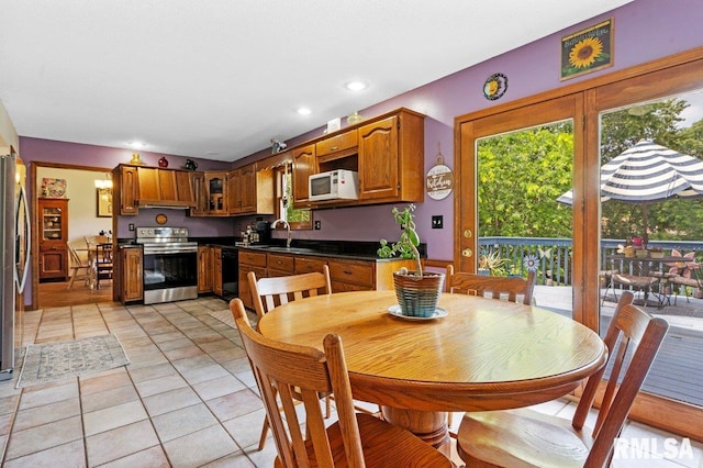 3713 Tyler Ct, Springfield, IL 62711 - dining area featuring light tile patterned flooring and recessed lighting