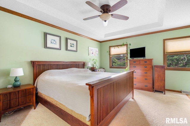 3713 Tyler Ct, Springfield, IL 62711 - bedroom featuring carpet floors, a raised ceiling, ornamental molding, a textured ceiling, and a ceiling fan