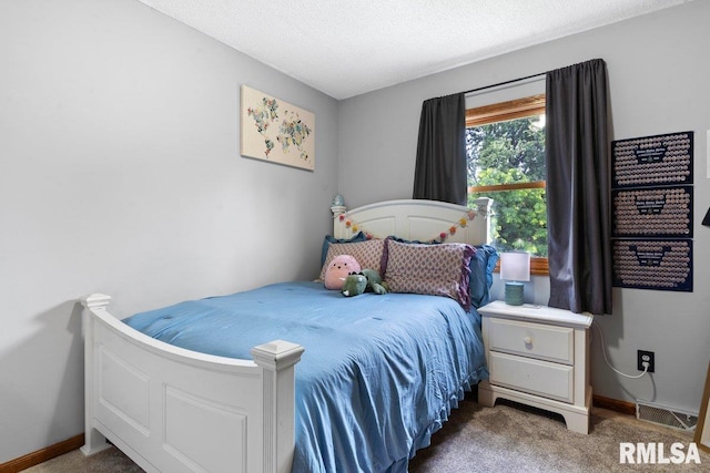 3713 Tyler Ct, Springfield, IL 62711 - carpeted bedroom featuring baseboards and a textured ceiling
