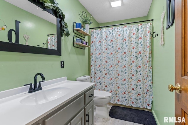 3713 Tyler Ct, Springfield, IL 62711 - bathroom featuring vanity, curtained shower, and a textured ceiling