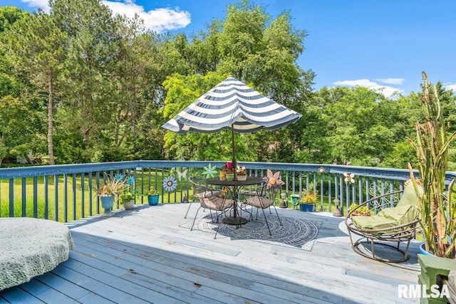 3713 Tyler Ct, Springfield, IL 62711 - wooden deck with outdoor dining space, a yard, and view of scattered trees