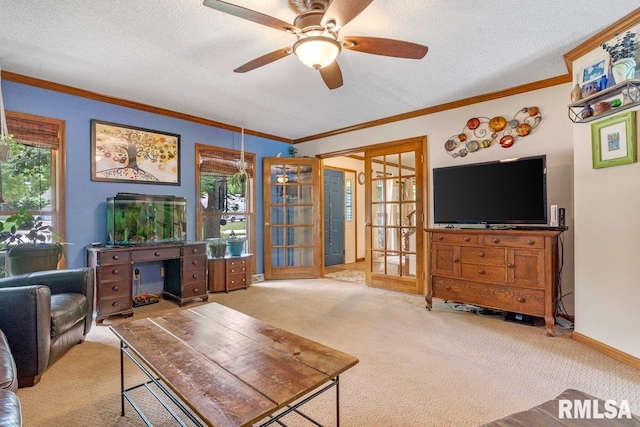 3713 Tyler Ct, Springfield, IL 62711 - carpeted living room with ornamental molding, french doors, a ceiling fan, and a textured ceiling